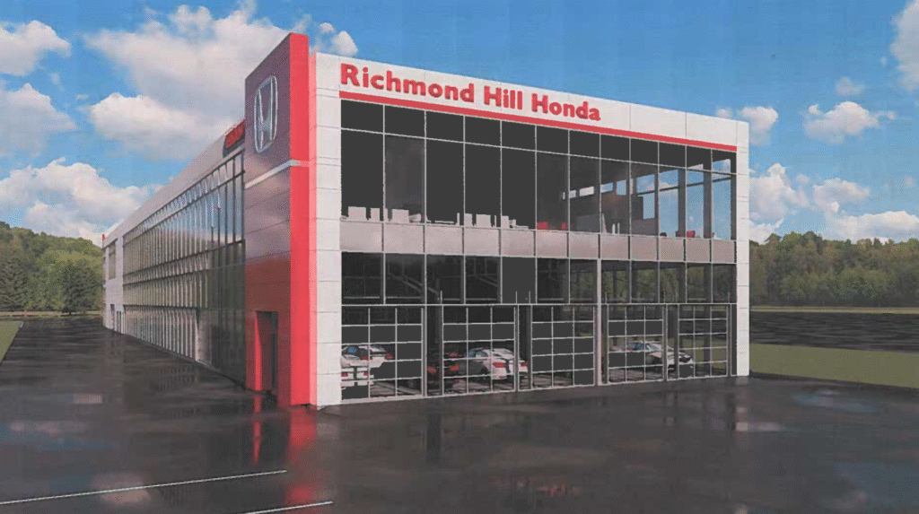 Visual representation of the new Honda dealership in Richmond, featuring sleek design and ample parking space.